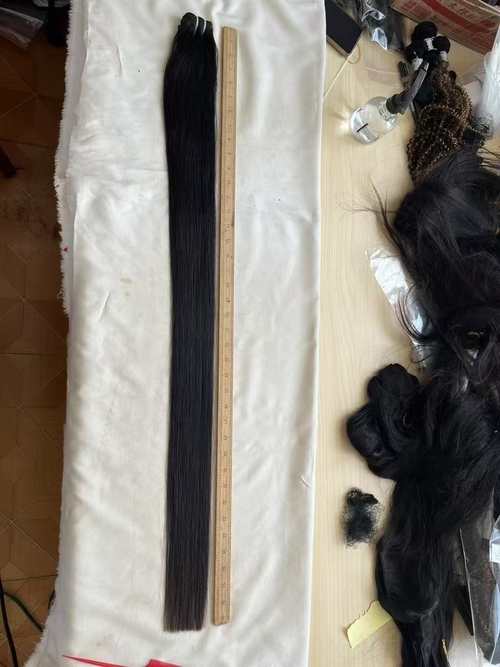 آخرین مورد شرکت 38 اينچ 40 اينچ طبيعي سياه راست و بانو موي انسان